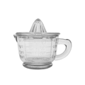 Clear glass juicer with measurement markings on a white background
